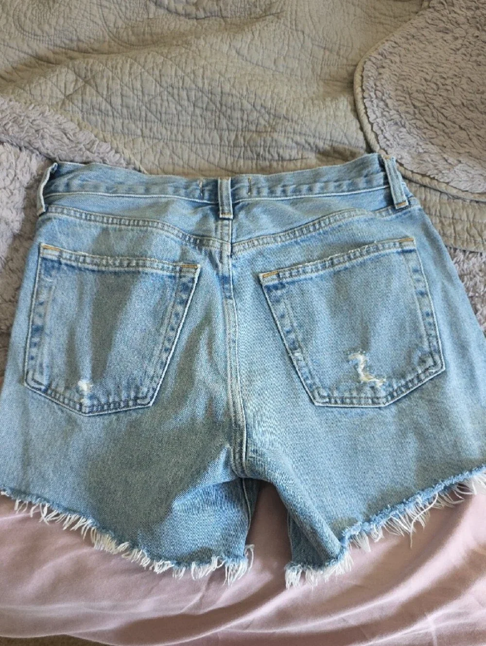 Agolde Light Wash Distressed Denim Cutoff Shorts